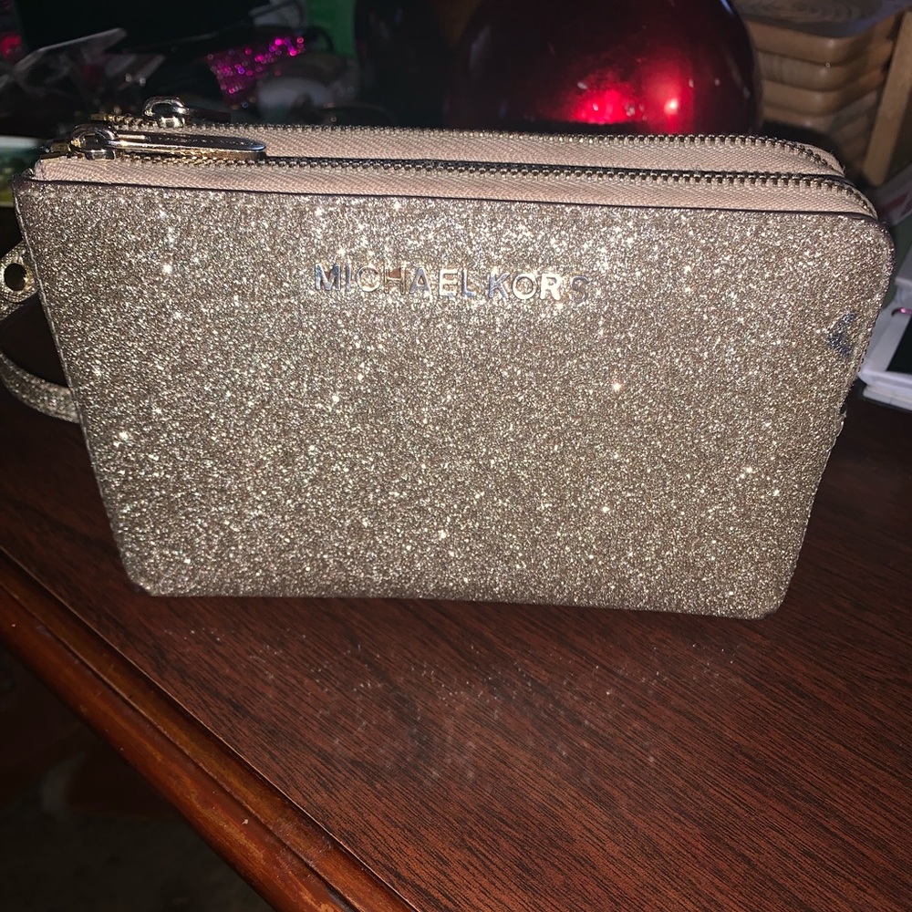 Michael Kors gold glitter and brown wristlet.